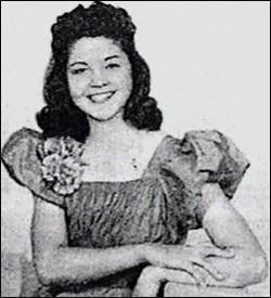 A person in a dress Description automatically generated