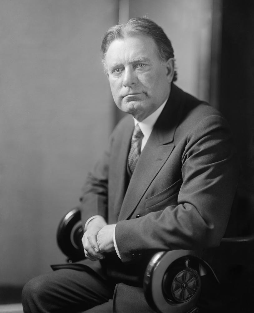 A person in a suit and tie

Description automatically generated with medium confidence