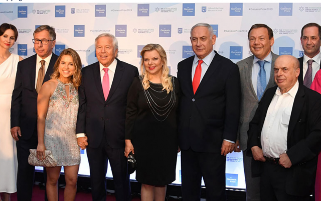 From left to right: Ekaterina Kosina, Petr Aven, Jessica Kraft, Robert Kraft, Sara Netanyahu, Benjamin Netanyahu, Mikhail Fridman, and Natan Sharansky on the red carpet at the Genesis Prize ceremony, on June 20, 2019. (Haim Zach/GPO)