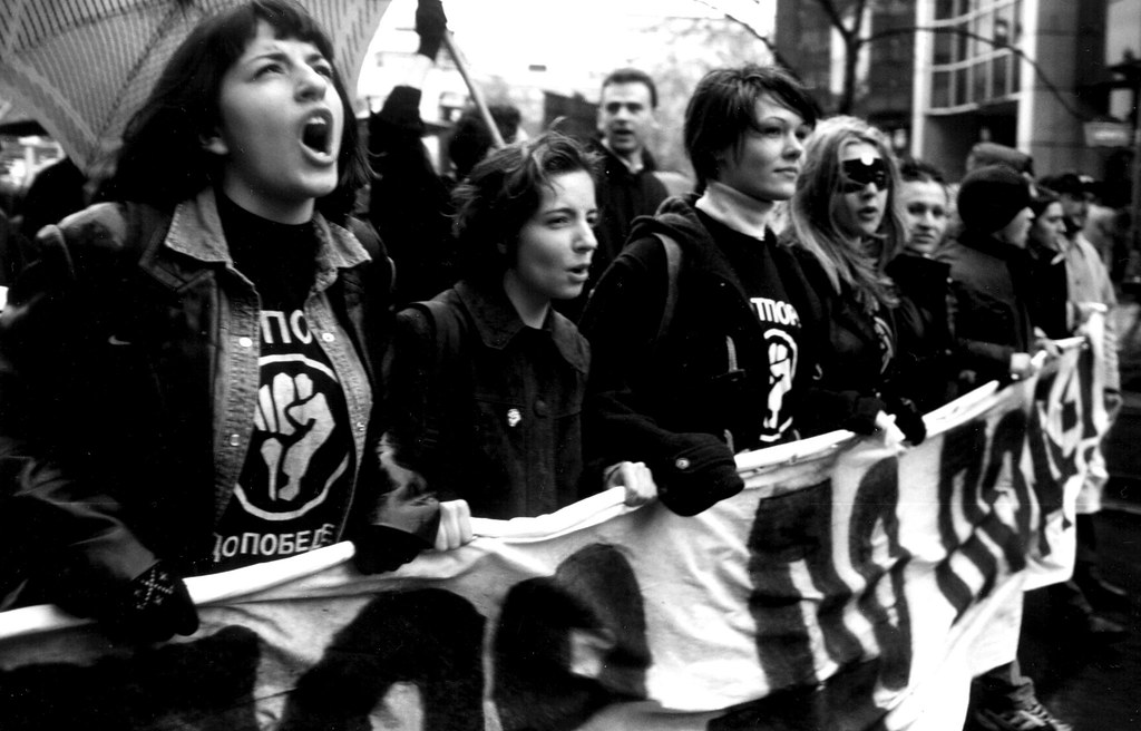 A group of people protesting

Description automatically generated