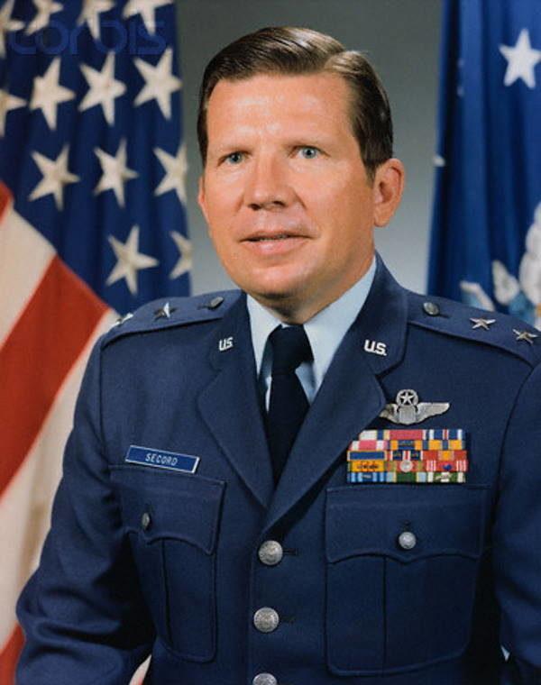 A person in a military uniform

Description automatically generated