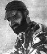 A person with a beard

Description automatically generated