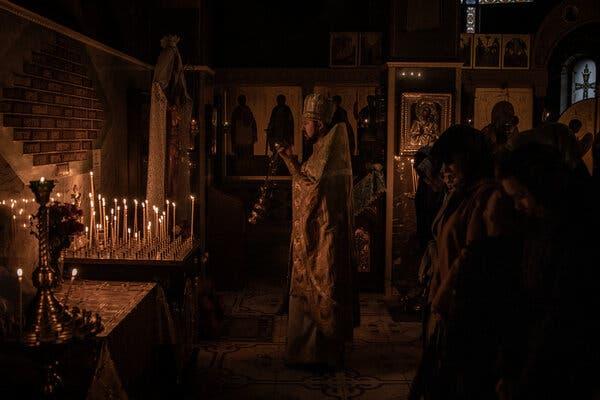 A priest leading a Sunday service at a Russian Orthodox Church in the city of Kryvyi Rih, in Ukraine’s Dnipro region, in October. 