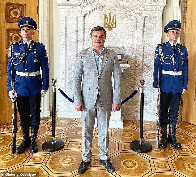 Oleksiy Kovalyov, 33, (centre) a senior official in charge of agriculture in the Moscow-appointed military-civil administration in Kherson, was killed with a pump action shotgun at his residence in the city of Hola Prystan earlier this year