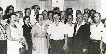 A group of people posing for a photo Description automatically generated