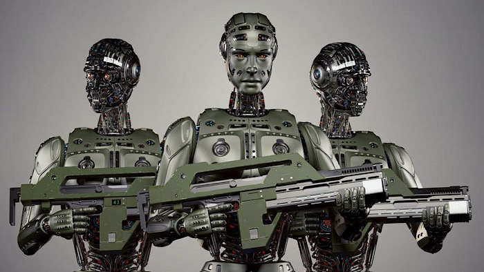 A group of robots holding an object
Description automatically generated