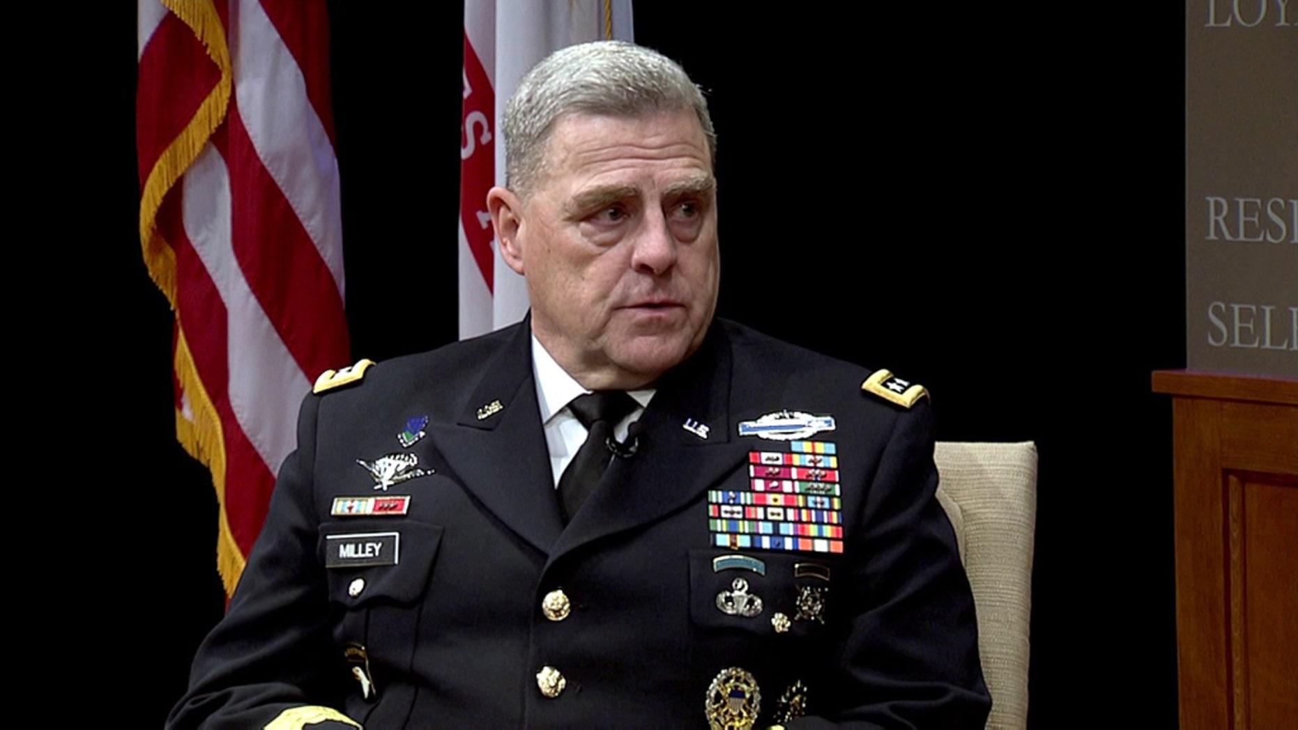 A person in a military uniform

Description automatically generated