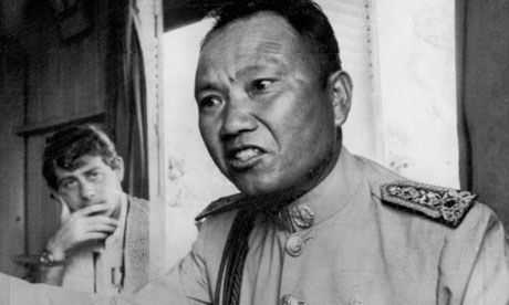 A person in military uniform

Description automatically generated