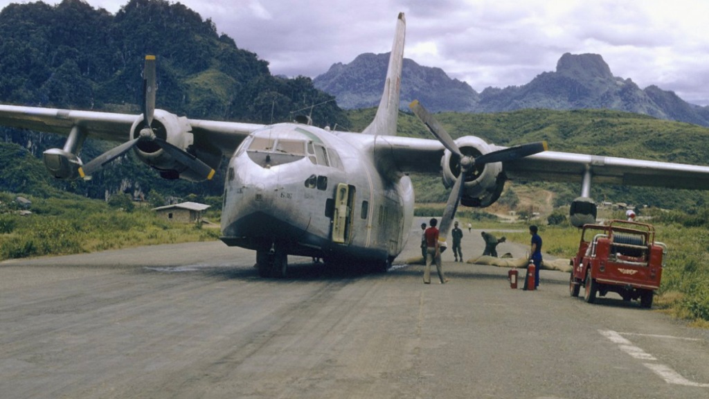 A plane on the runway

Description automatically generated