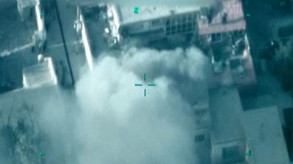 A smoke coming out of a building Description automatically generated