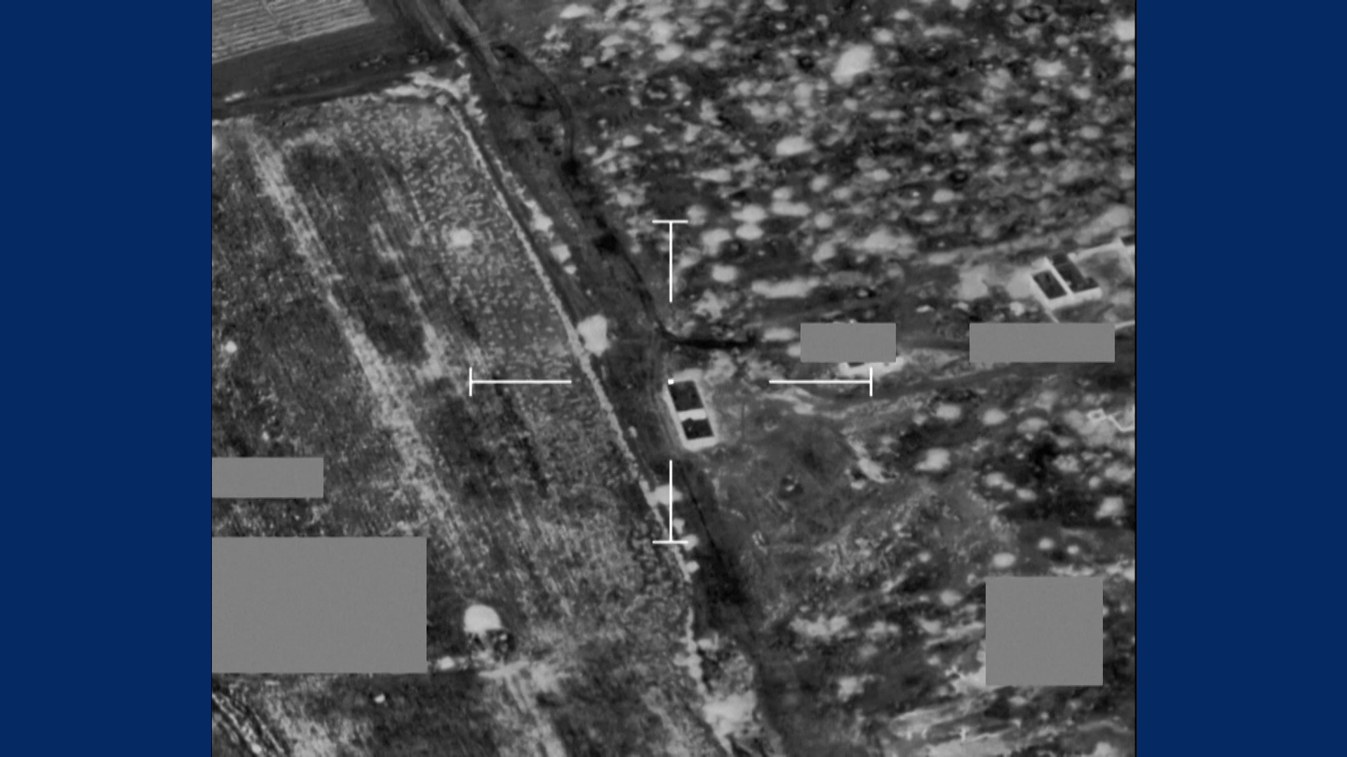 An aerial view of a field

Description automatically generated