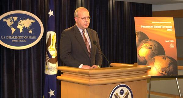 Coordinator for Counterterrorism Cofer Black briefs press on release of 2002 Patterns of Global Terrorism report, April 30, 2003. [Department of State photo by Michael Gross]