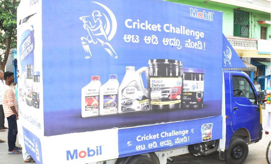 A advertisement on a truck
Description automatically generated