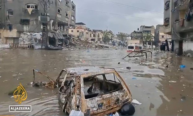 A car in a flooded area Description automatically generated