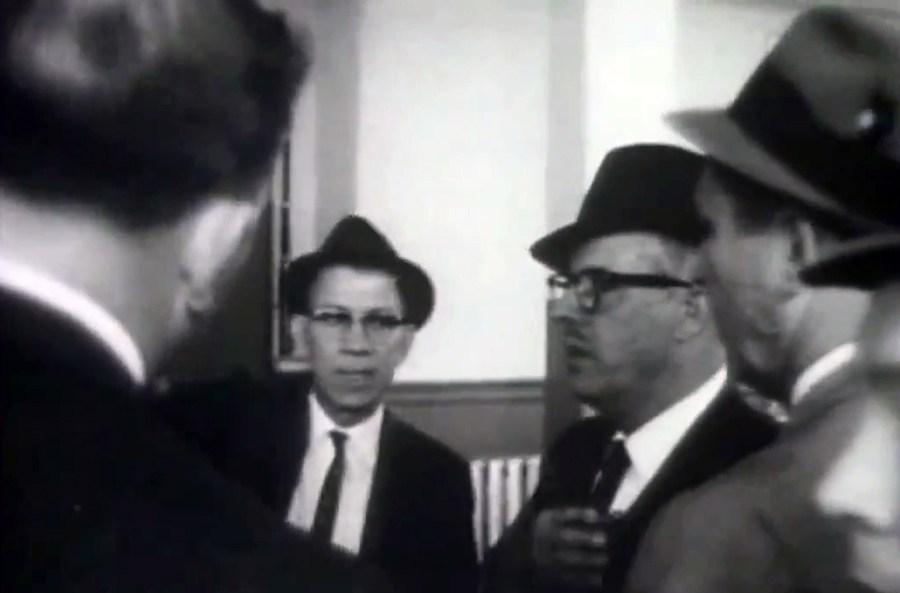 A group of men wearing suits and ties

Description automatically generated