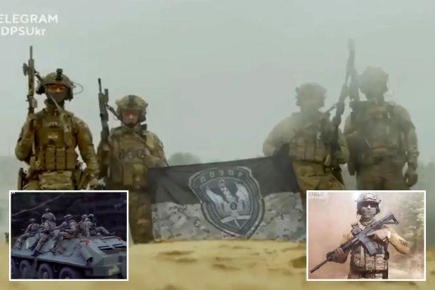 A group of soldiers holding guns

Description automatically generated