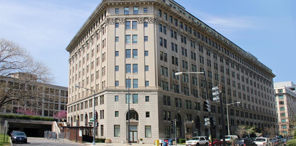 A large building with many windows

Description automatically generated