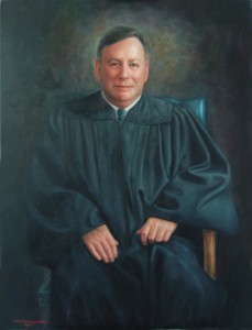 A person in a black robe

Description automatically generated