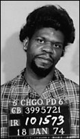 A person in a mugshot
Description automatically generated
