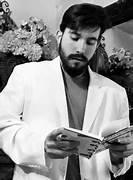 A person in a white jacket

Description automatically generated