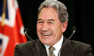 A person smiling at the camera

Description automatically generated