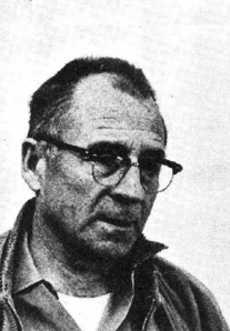 A person wearing glasses and a leather jacket

Description automatically generated