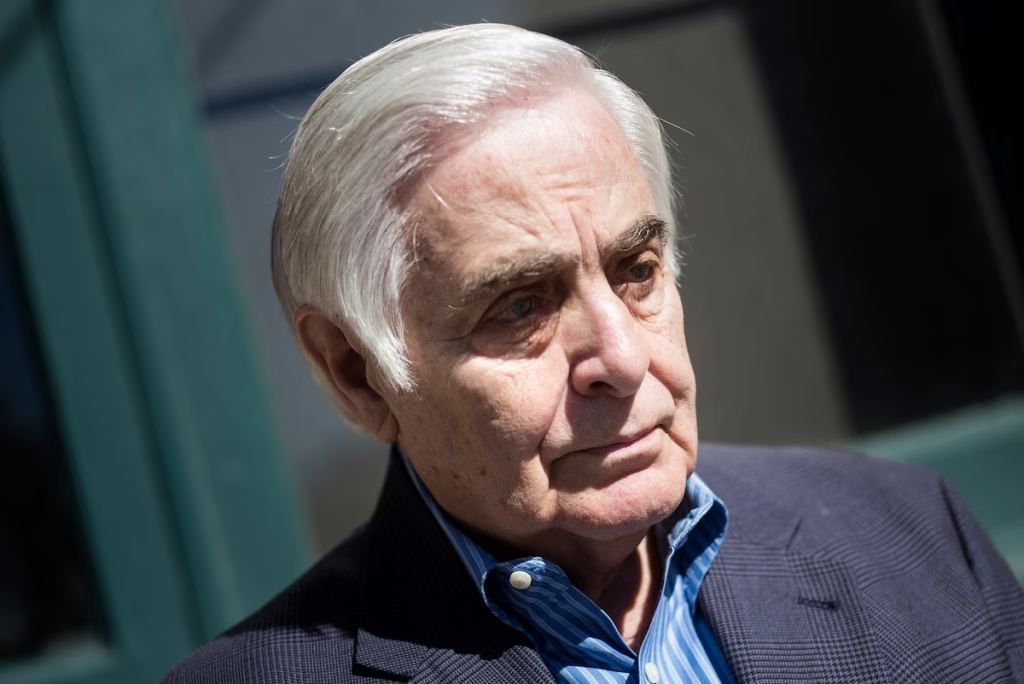 A person with white hair Description automatically generated