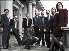 A new generation, a new outlook: Members of the National Security Council include, from left, Michelle Davis, John Simon, Michael Allen, Frederick Jones (kneeling), William Inboden, John Rood, Juan Zarate, Michelle Malvesti and Meghan O'Sullivan. 
