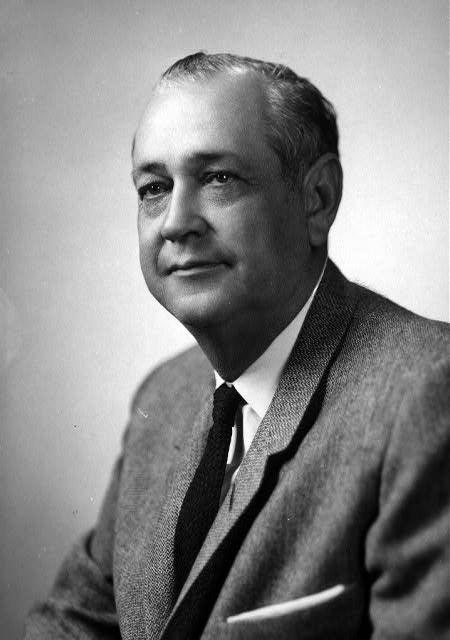 White man in suit and tie