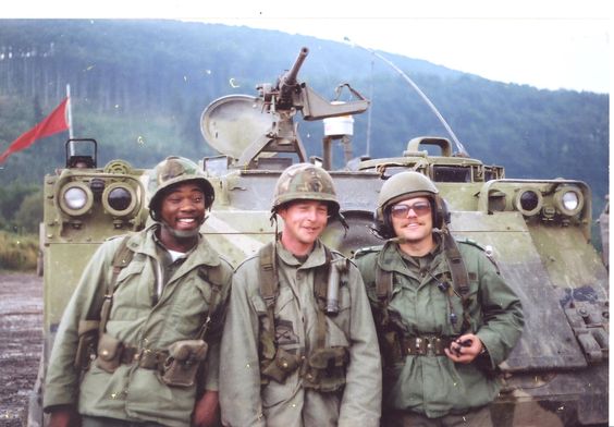A group of men in military uniforms

Description automatically generated