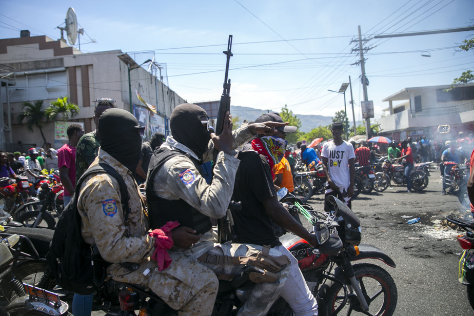 A group of people on motorcycles with guns

Description automatically generated