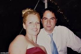 A person and person posing for a picture
Description automatically generated