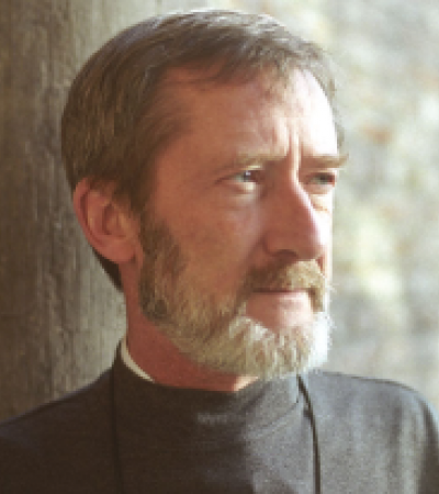 A person with a beard

Description automatically generated