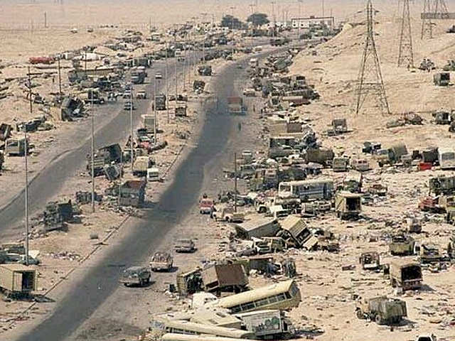 A road with many vehicles in the desert

Description automatically generated