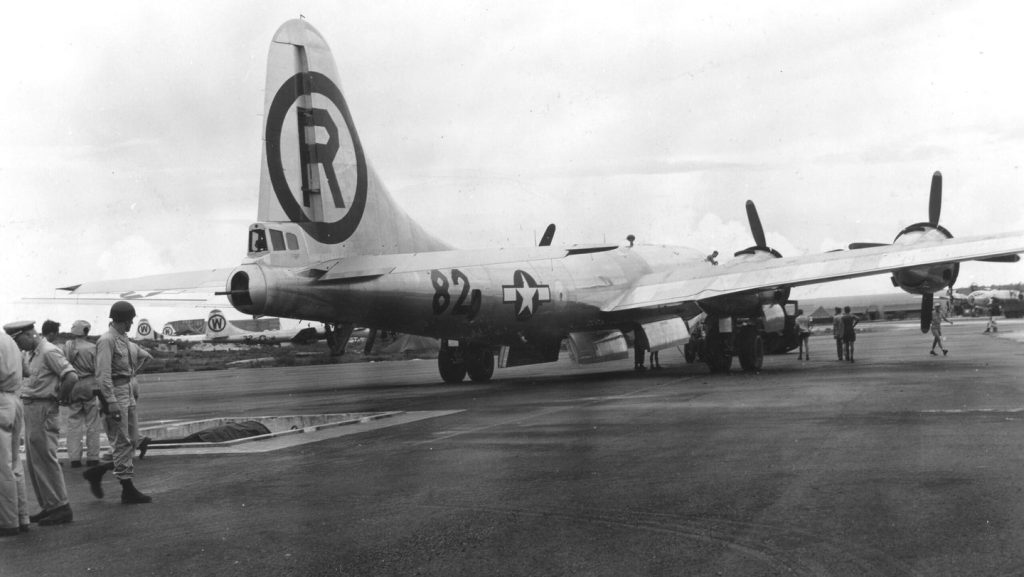 View of the B-29 Superfortress 'Enola Gay' as it is manouvered over the bomb pit on the North Field of Tinian airbase, North Marianas Islands, early August, 1945. The plane was loaded with an atomic bomb, codenamed 'Little Boy,' which it then dropped on the Japanese city of Hiroshima on August 6. (Photo by PhotoQuest/Getty Images)