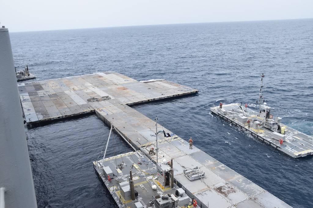 A large dock with a few people on it

Description automatically generated with medium confidence