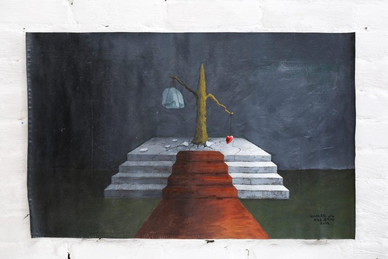 A painting of a tree on a staircase

Description automatically generated