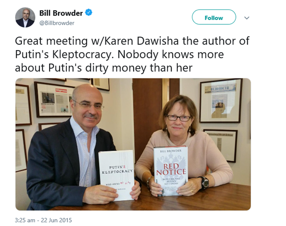 A person and person holding books

Description automatically generated