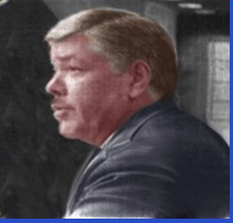A person in a suit

Description automatically generated