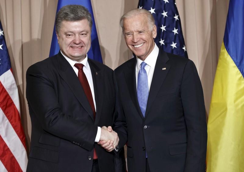 Biden welcomes passage of Ukraine reforms in call with Poroshenko: White  House | Reuters