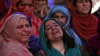 A group of women wearing headscarves

Description automatically generated