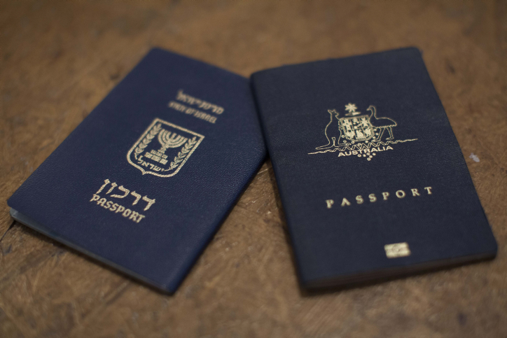 A pair of blue passports

Description automatically generated