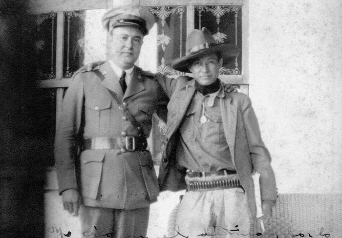 A person and person in military uniforms

Description automatically generated