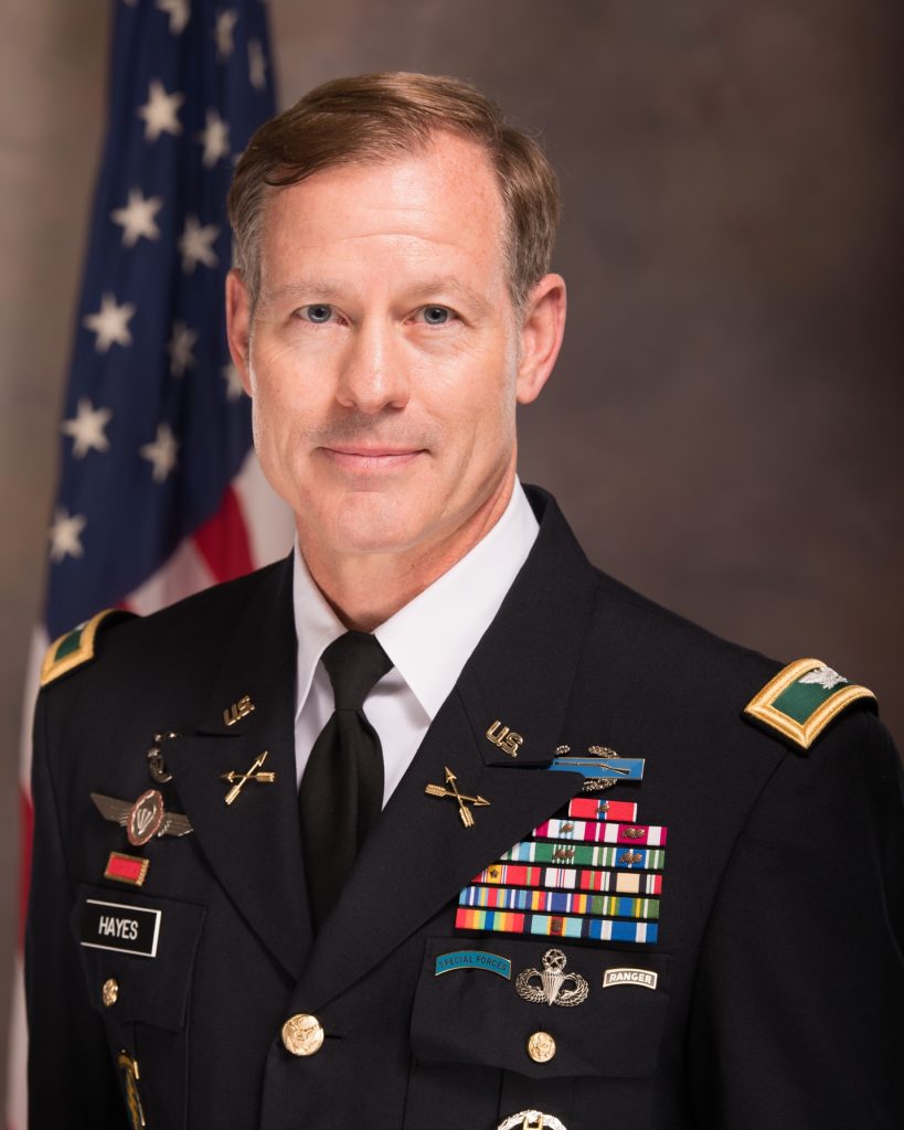 A person in a military uniform
Description automatically generated