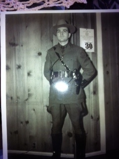A person in a uniform
Description automatically generated