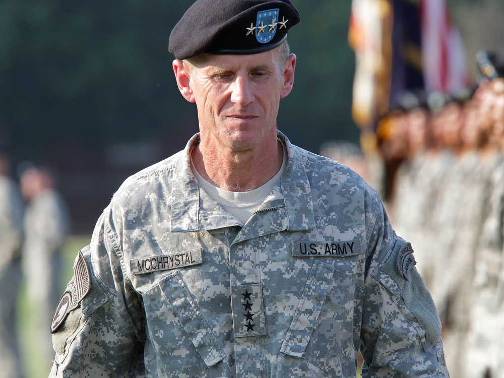A person in military uniform
Description automatically generated