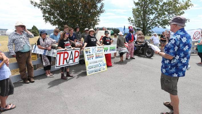 The Anti-Bases Campaign organiser Murray Horton, right, gives a speech at a protest against Waihopai Station last year.
