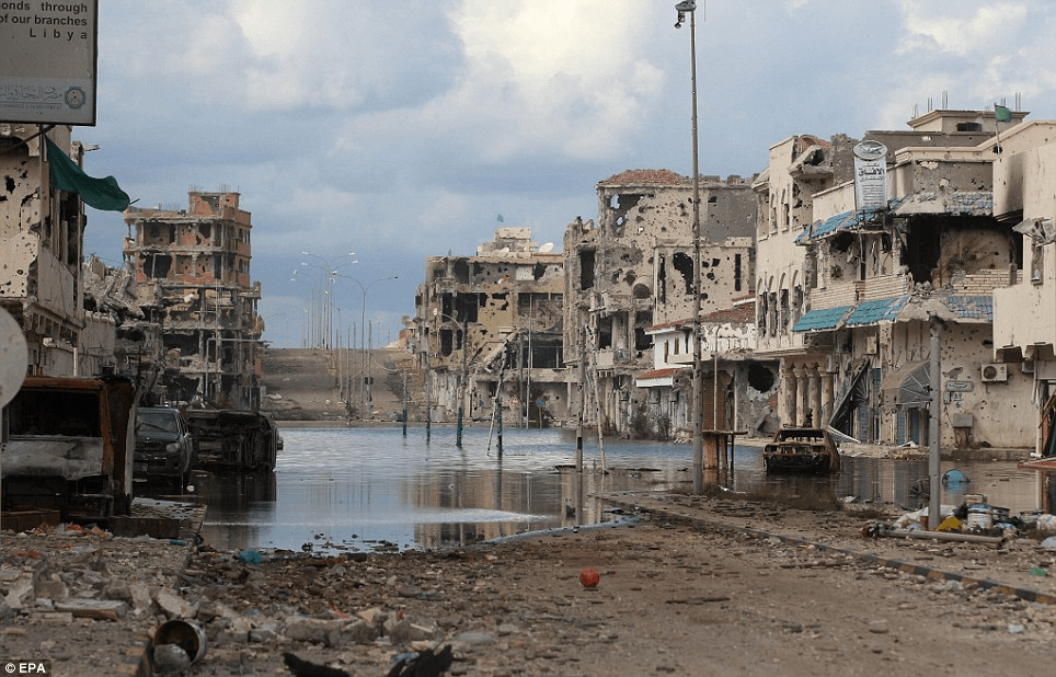 A city destroyed by war

Description automatically generated