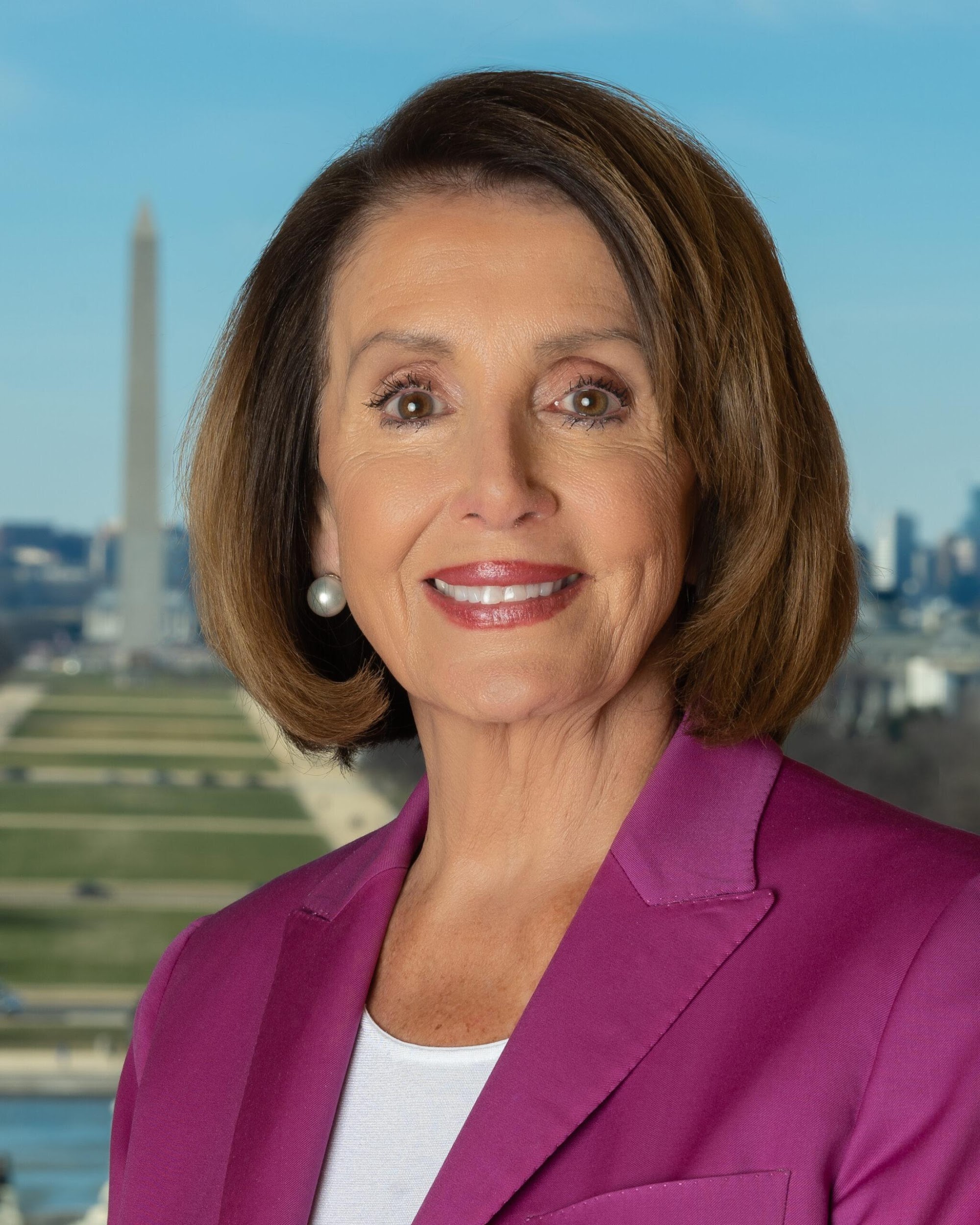 A person in a pink jacket

Description automatically generated