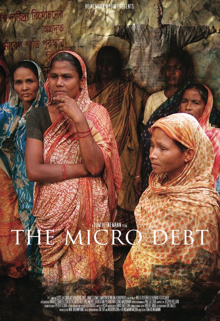 A group of women in colorful saris
Description automatically generated